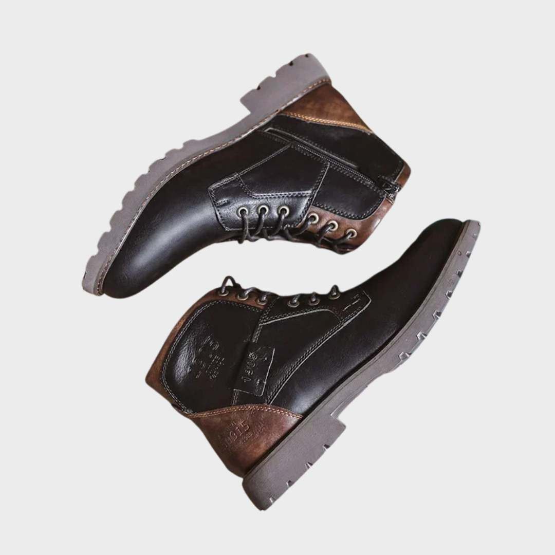 Black and brown lace-up ankle boots with lug soles, shown flat paired | Chaps London