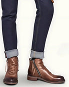 Brown leather ankle boots with side zippers, worn with cuffed navy jeans | Chaps London