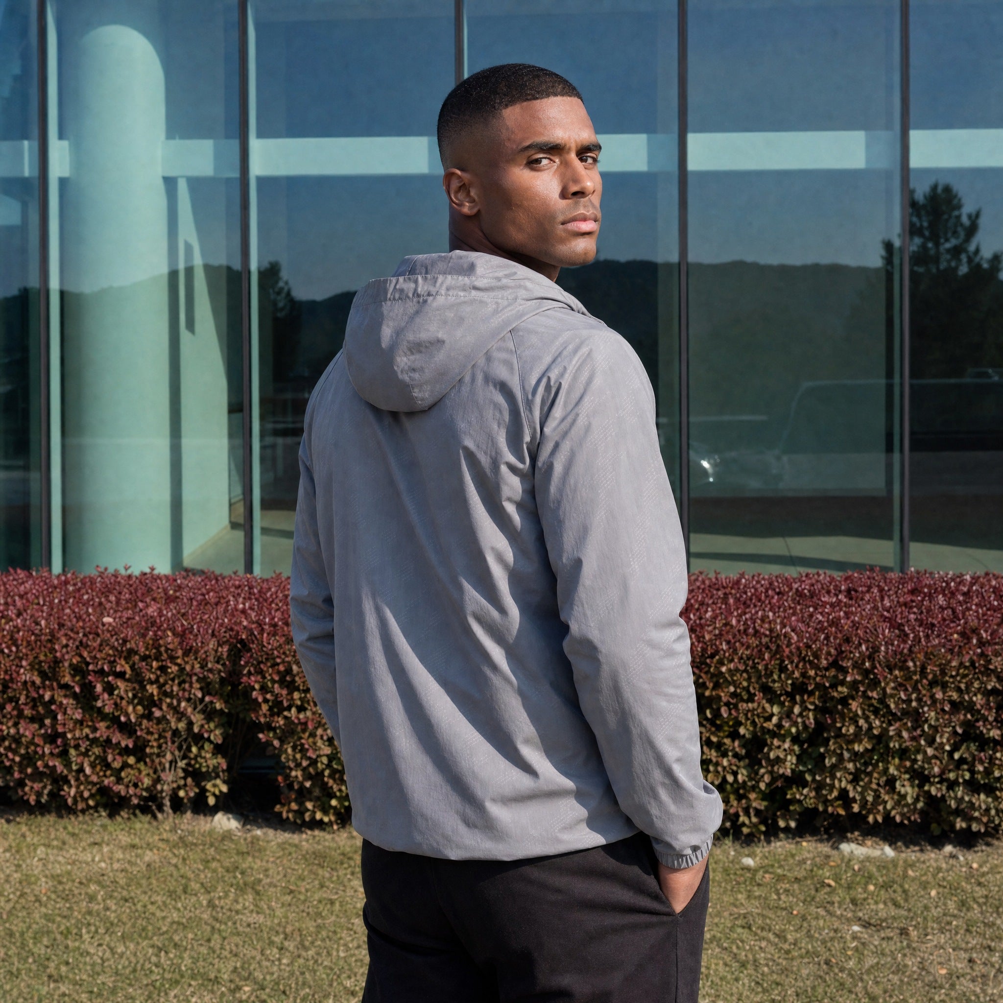 Men's lightweight hooded windbreaker jacket in grey