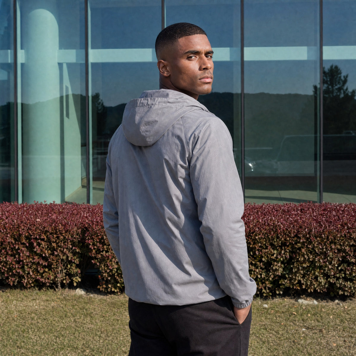 Men's lightweight hooded windbreaker jacket in grey