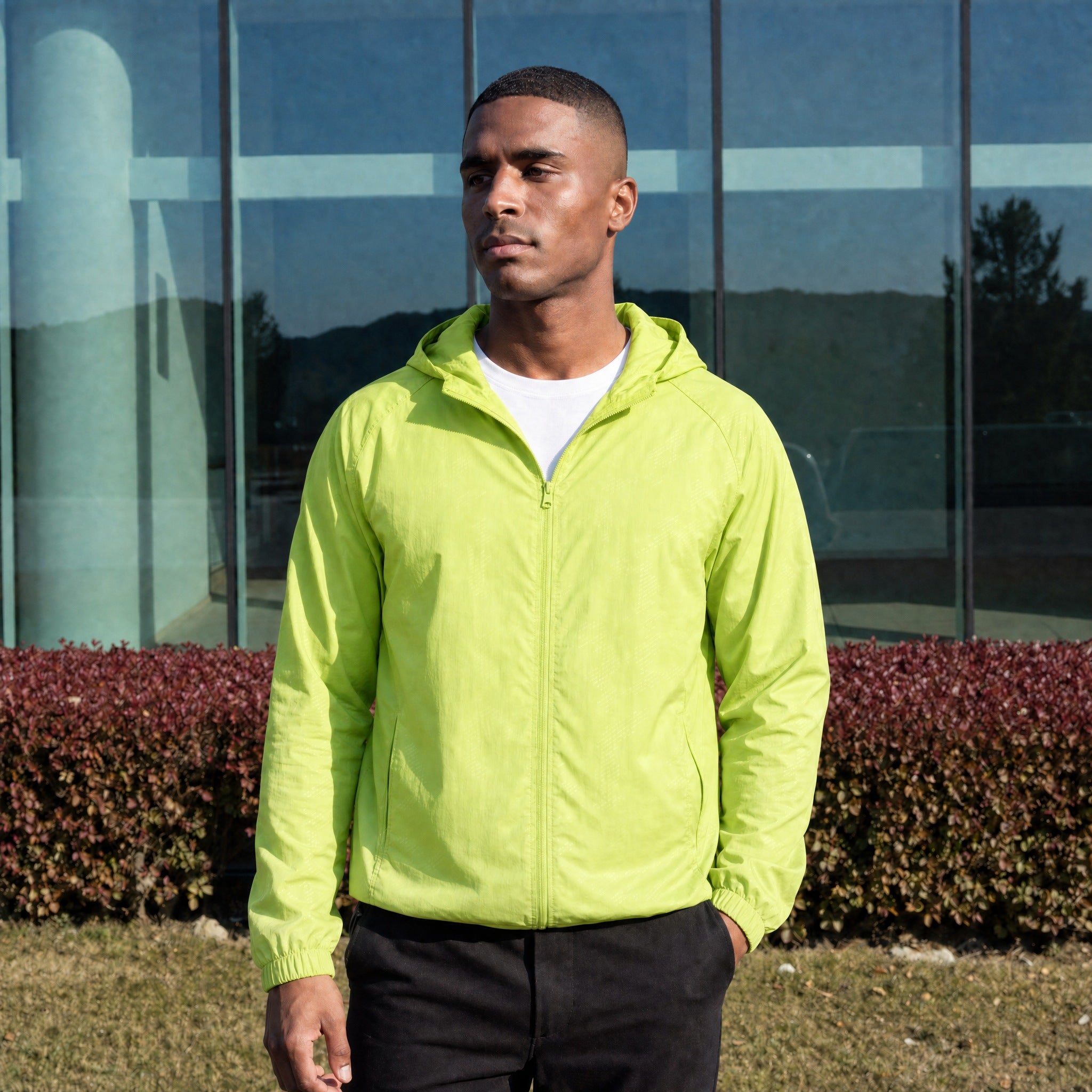 Men's lightweight hooded windbreaker jacket in light green