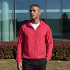 Men's lightweight hooded windbreaker jacket in red