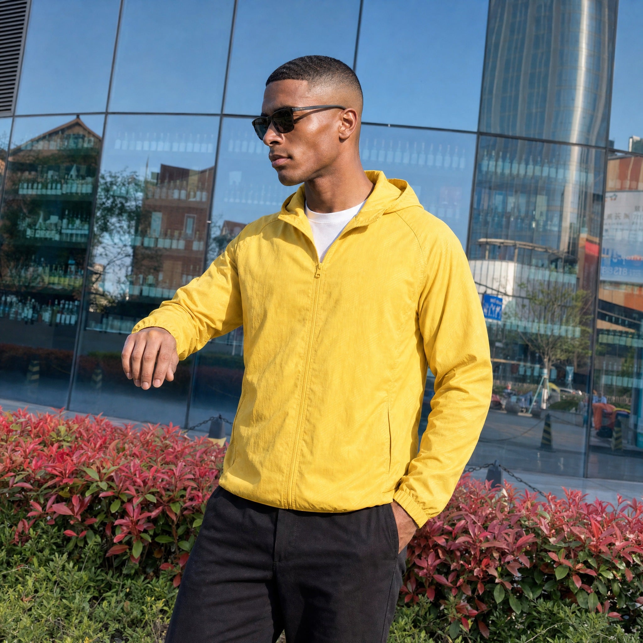 Men's lightweight hooded windbreaker jacket in yellow