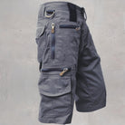 Gray cargo shorts with multiple zippered pockets, shown flat on display | Chaps London