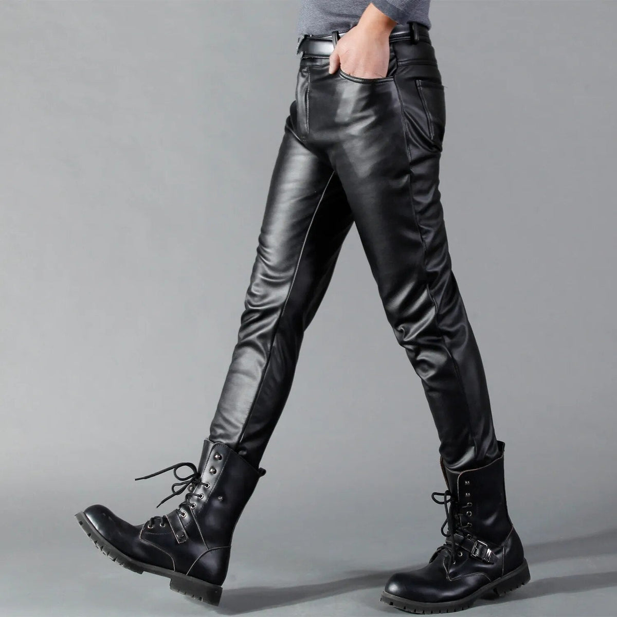 Man wearing black slim fit faux leather trousers with lace-up boots | Chaps London