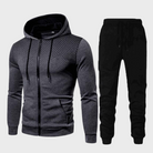 Dark gray textured zip-up hoodie with black jogger pants, flat lay | Chaps London