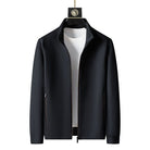 Black zip-up jacket with stand collar, displayed on hanger over shirt | Chaps London