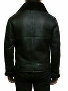 Black leather jacket with fur collar, worn by man, back view | Chaps London