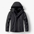 Black hooded waterproof jacket with zippered pockets, shown flat on background | Chaps London