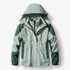 Sage green and dark green hooded waterproof jacket laid flat | Chaps London