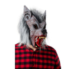 Grey werewolf mask with open mouth worn by person in plaid shirt | Chaps London