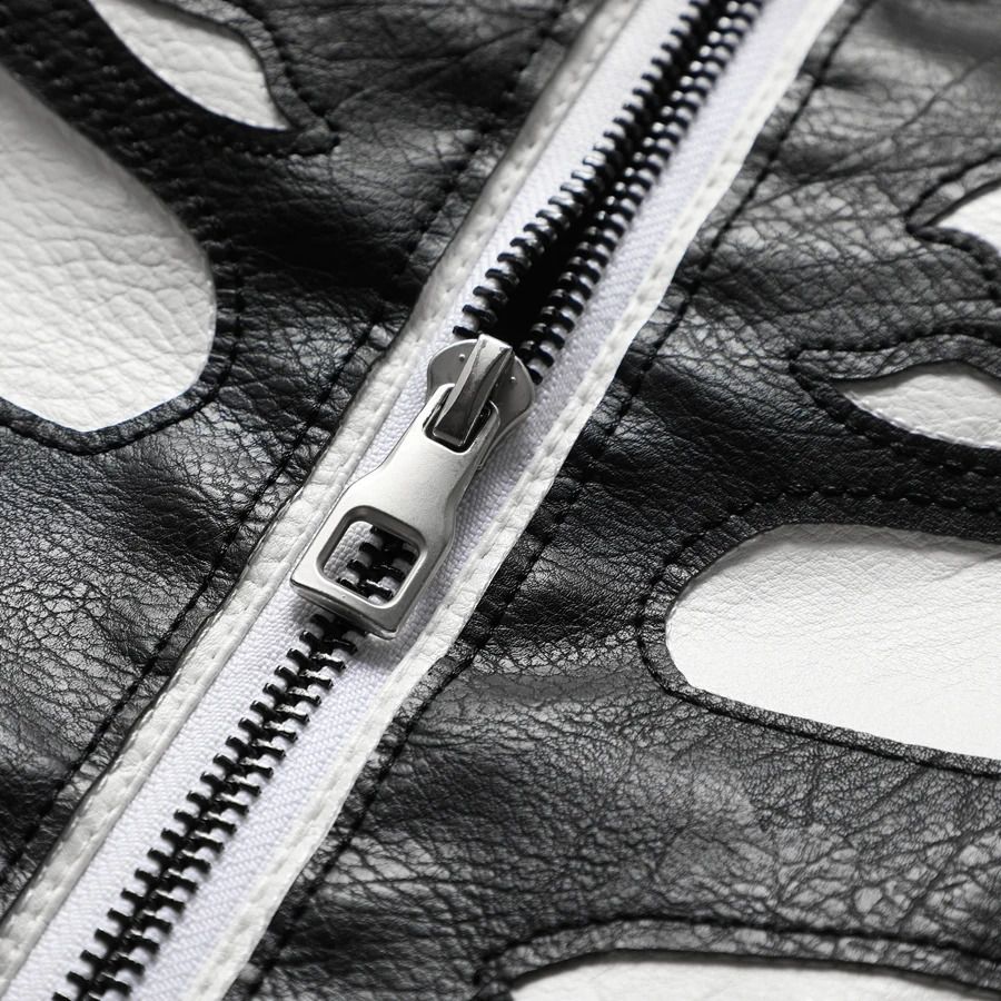 Close-up of silver zipper on black jacket with skeleton bone pattern | Chaps London