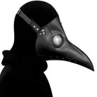 Black plague doctor mask with round eye piece, worn by mannequin | Chaps London