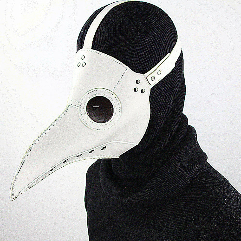 White plague doctor mask with beak worn by person in black hood | Chaps London
