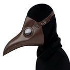 Brown round-eyed plague doctor mask worn by person in black hoodie | Chaps London