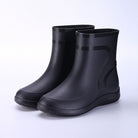 Pair of black short ankle rain boots, matte finish, no person | Chaps London