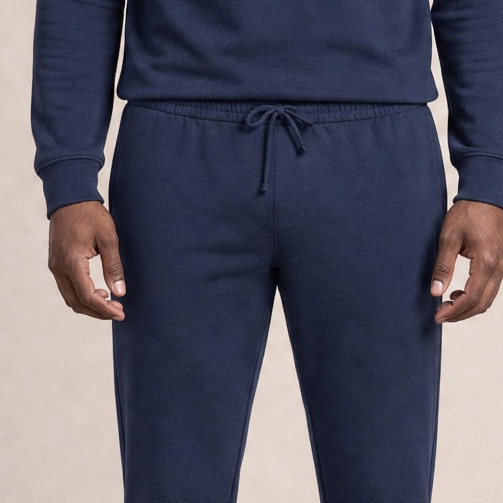Man wearing navy joggers and hoodie, drawstring waist, worn by person | Chaps London