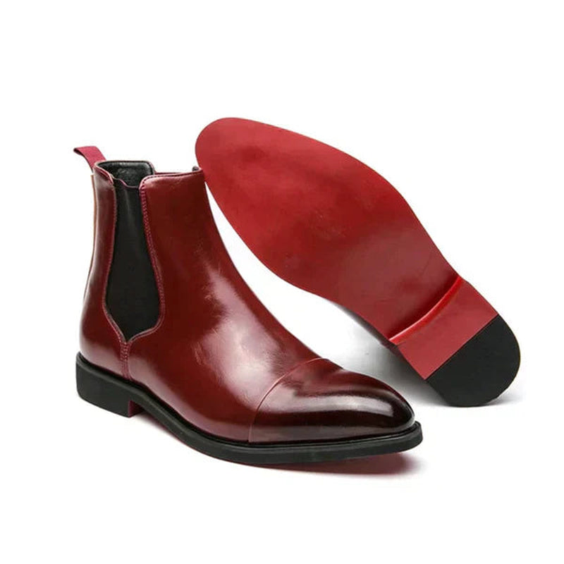 Burgundy faux leather Chelsea boot pair with glossy red soles shown | Chaps London