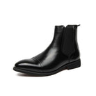 Black faux leather Chelsea boot with elastic side panel, shown standing alone | Chaps London