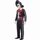 Man in black Day of the Dead mariachi costume with white skull mask, sombrero, red cravat, skull buckle and white gloves, side view | Chaps London