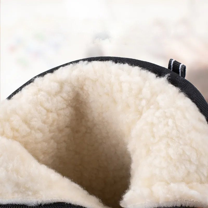 Black boot with plush cream fleece lining, close-up interior view | Chaps London