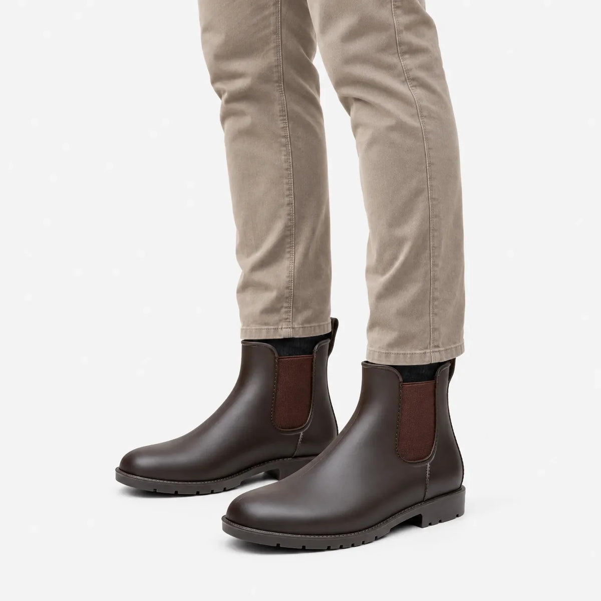 Brown Chelsea wellies worn with beige chinos