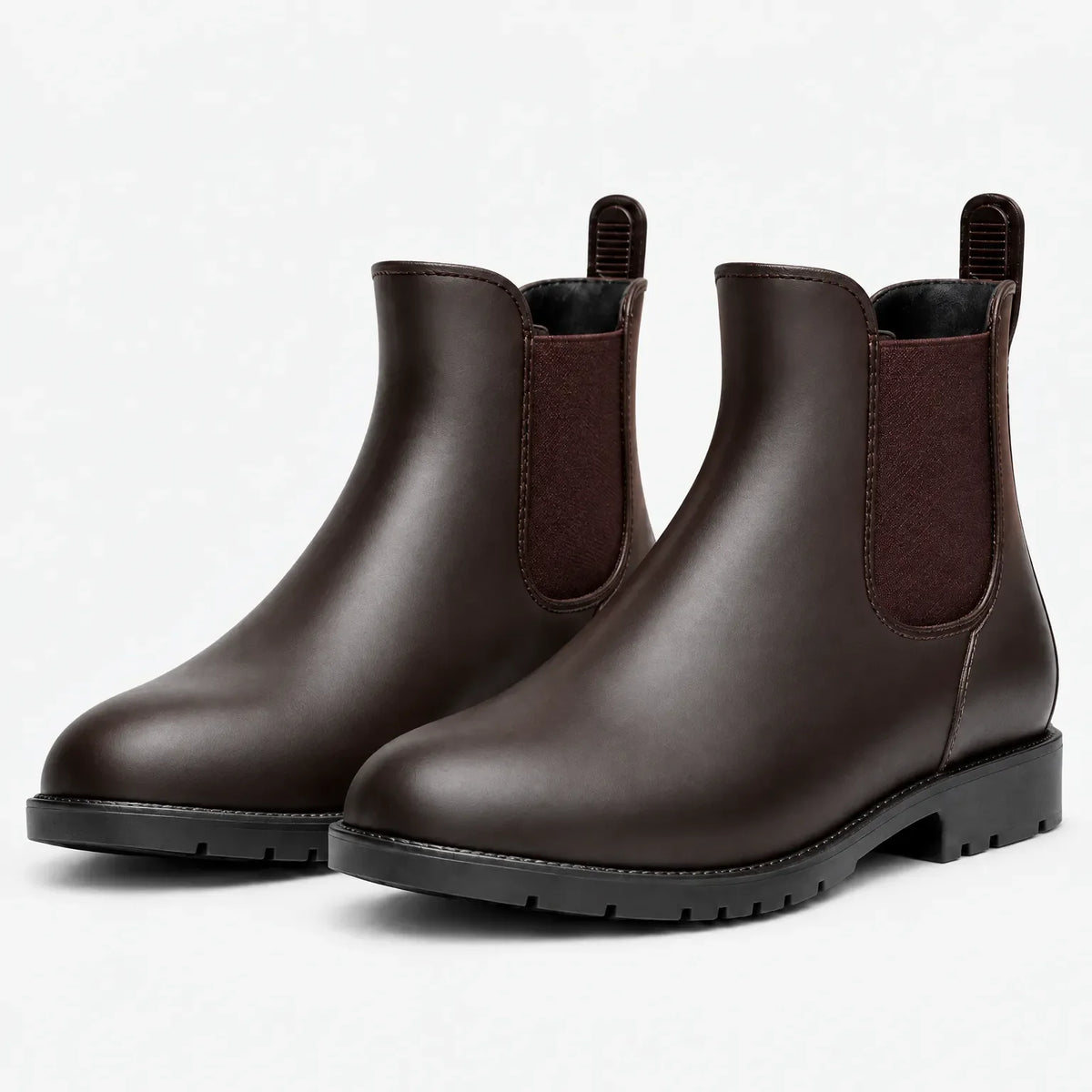 Pair of brown Chelsea wellies with pull tabs and treaded soles