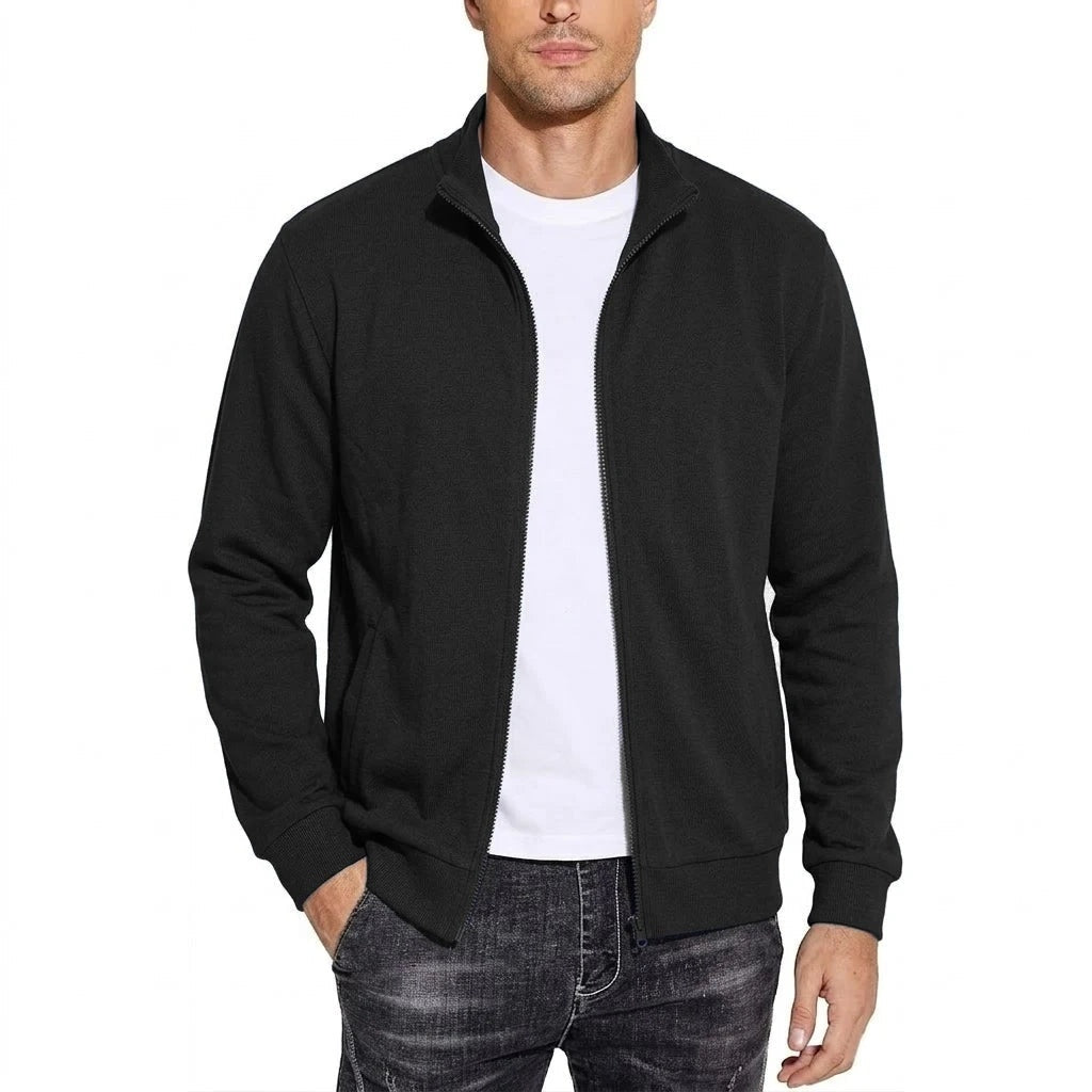 Man wearing black zip-up stand collar jacket with white t-shirt and jeans | Chaps London