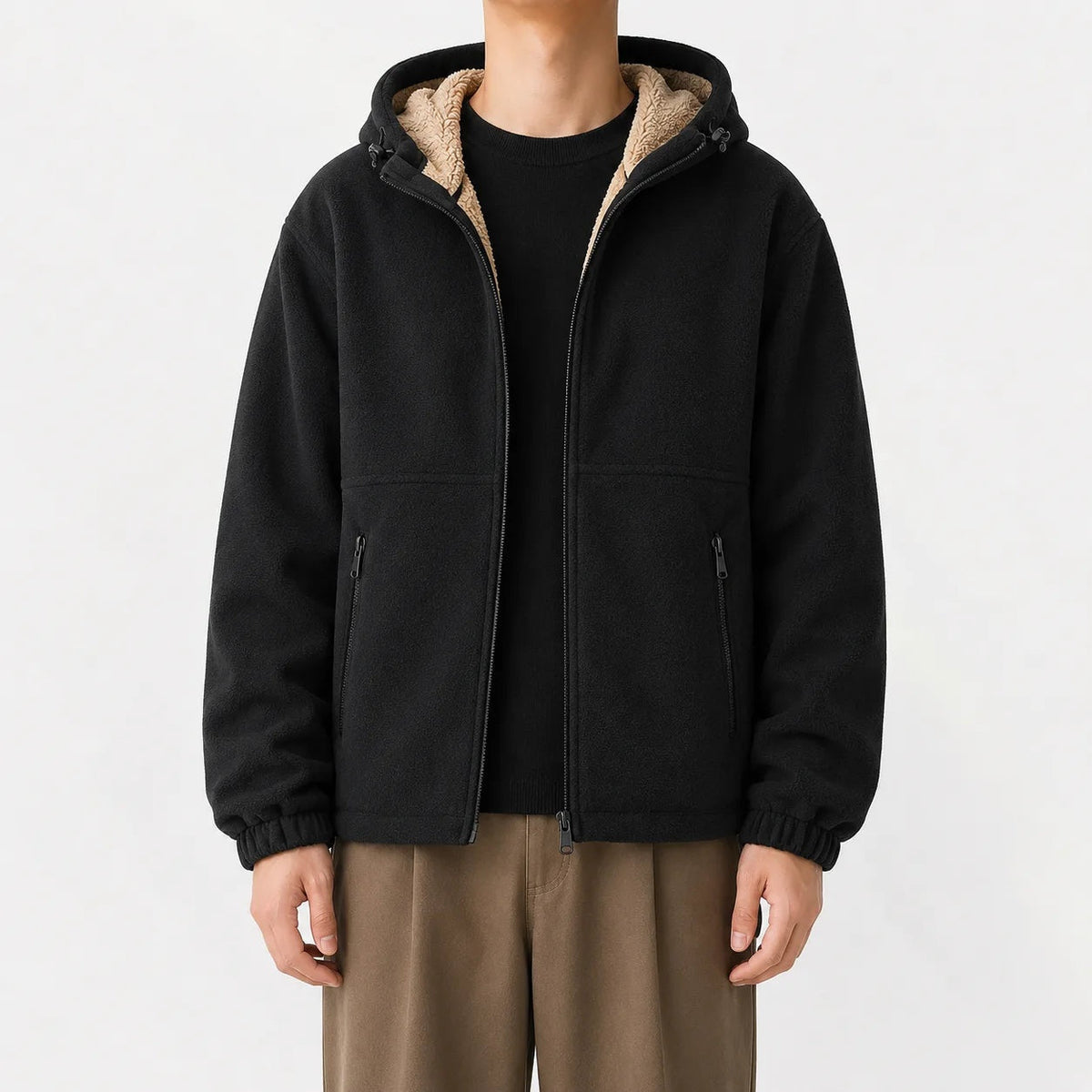 Black hooded zip jacket with sherpa trim, worn by man, front view | Chaps London