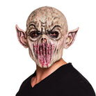Beige alien monster mask with pointed ears worn by man | Chaps London