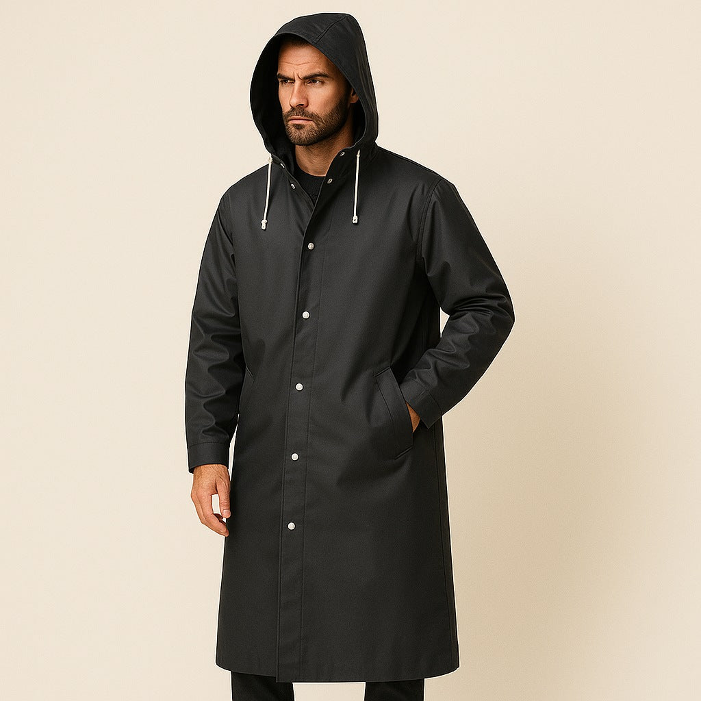 Man wearing black hooded long raincoat with drawstrings and press stud closures | Chaps London