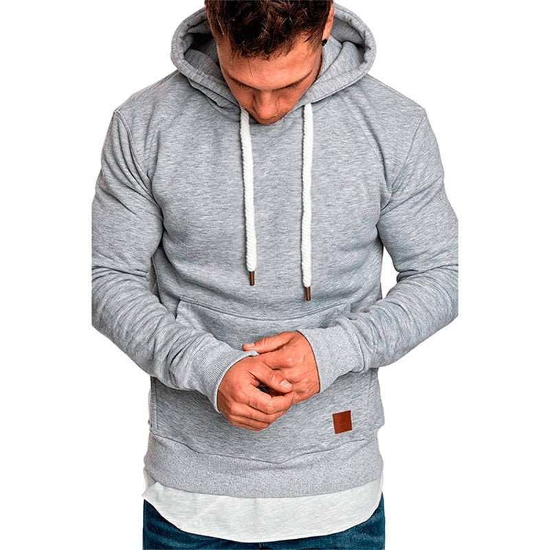 Man wearing grey layered hem hoodie with drawstrings, worn on model | Chaps London