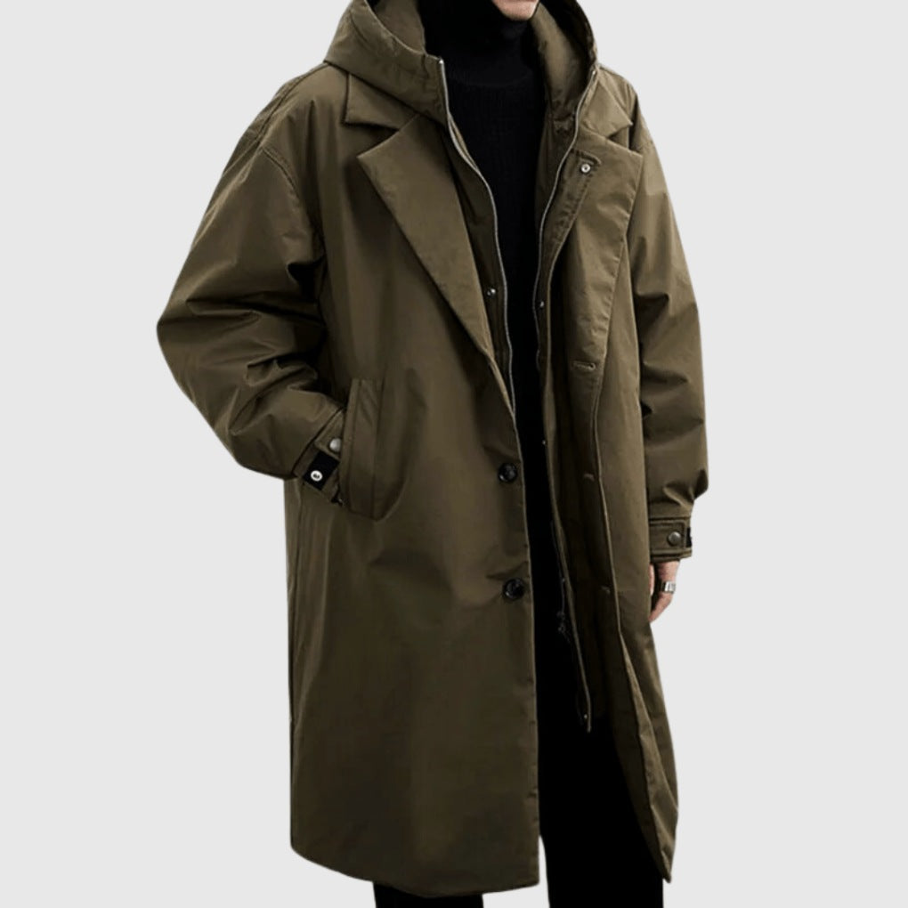Man wearing olive green hooded long raincoat with button closures and pockets | Chaps London