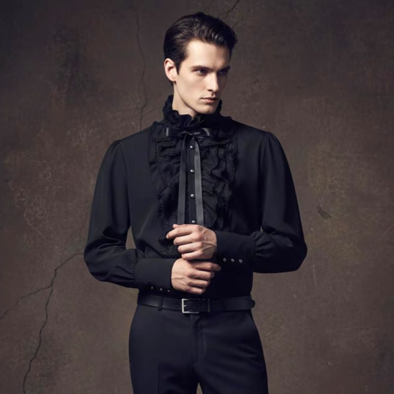 Black ruffled-collar shirt with bow tie, worn by man with black trousers | Chaps London