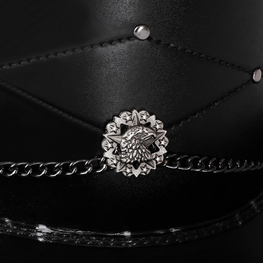Black top hat detail with eagle emblem, chain, and stitched panels | Chaps London