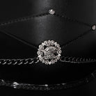 Black top hat detail with eagle emblem, chain, and stitched panels | Chaps London
