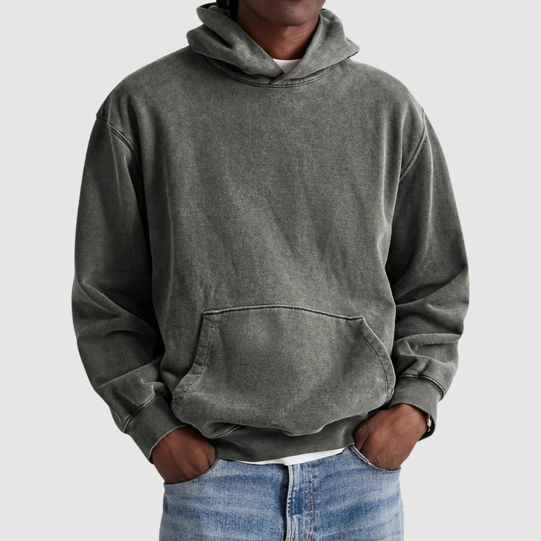 Man wearing oversized washed gray hoodie with kangaroo pocket, worn with jeans | Chaps London