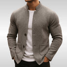 Man wearing gray textured knit stand collar cardigan with button front, hands in pockets | Chaps London