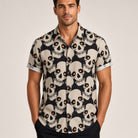 Man wearing black and beige short sleeve shirt with skull pattern print | Chaps London