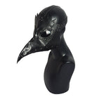 Black plague doctor mask with long beak on black mannequin bust | Chaps London