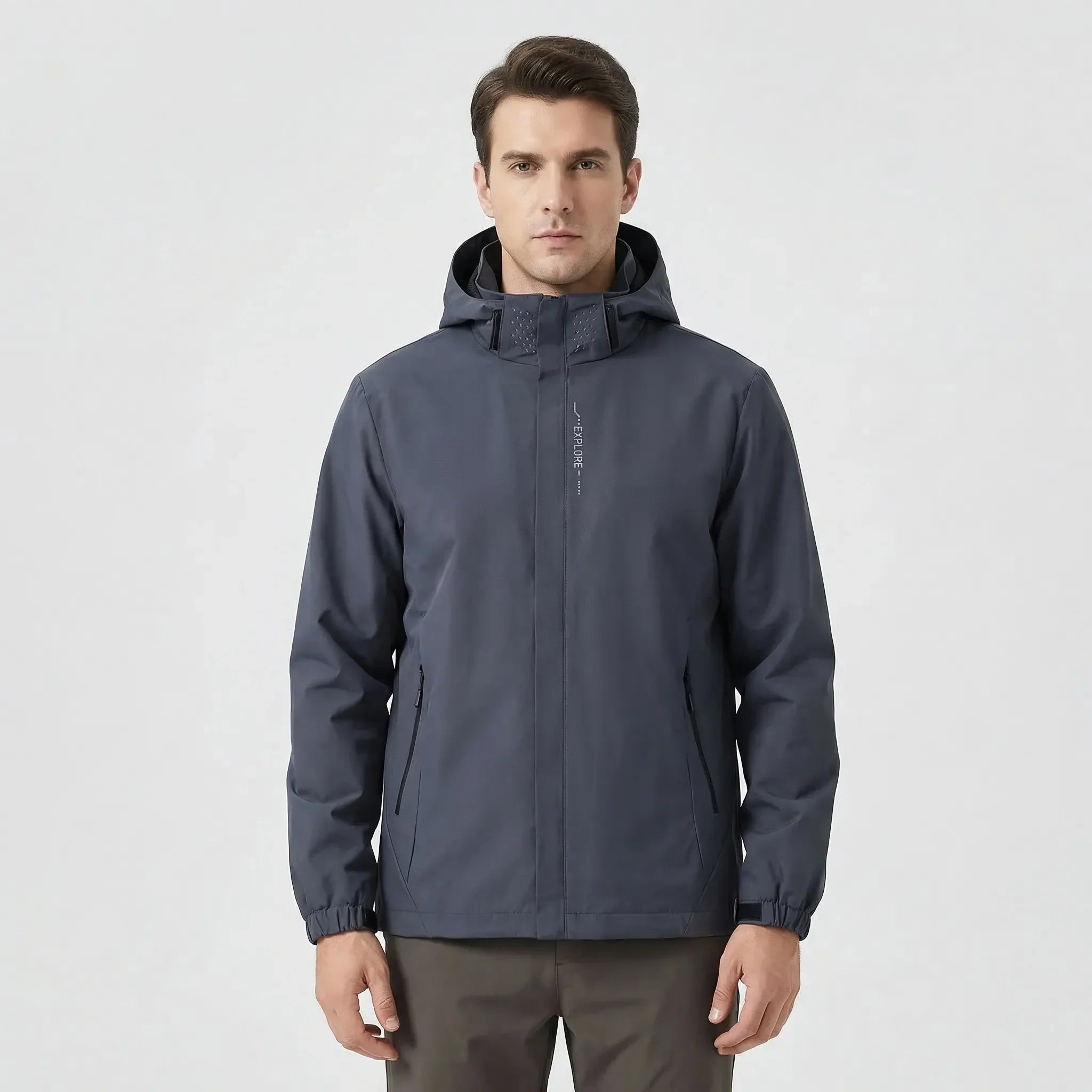 Man wearing dark grey hooded zip-up jacket with front pockets, front view | Chaps London
