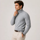 Man wearing grey ribbed turtleneck sweater with beige trousers, worn, casual style | Chaps London