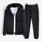 Black zip hoodie and matching joggers on hangers, white shirt underneath | Chaps London