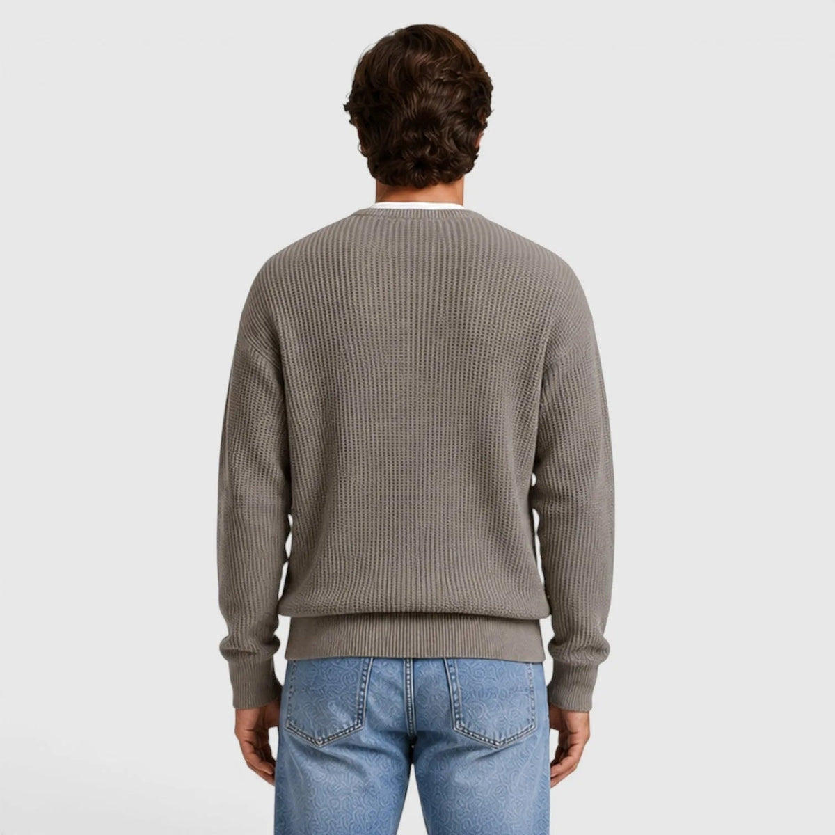 Man wearing grey ribbed knit sweater with jeans, back view shown | Chaps London