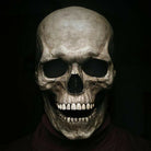 Grey skull mask with movable jaw worn by a person | Chaps London