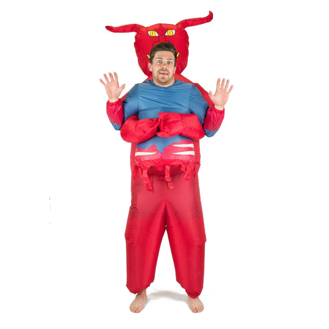 Man wearing red inflatable devil costume with horns and arm wings | Chaps London
