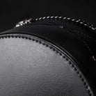 Close-up of black top hat with chain detail and stitching | Chaps London
