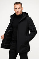 Man wearing black hooded parka with quilted panel, worn open over turtleneck | Chaps London