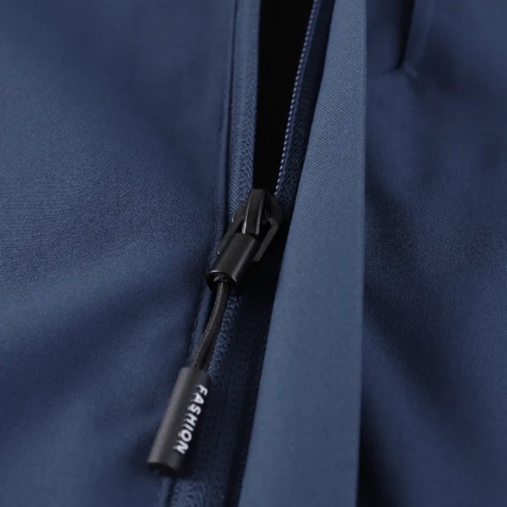 Close-up of navy jacket zipper pull with black zip closure | Chaps London