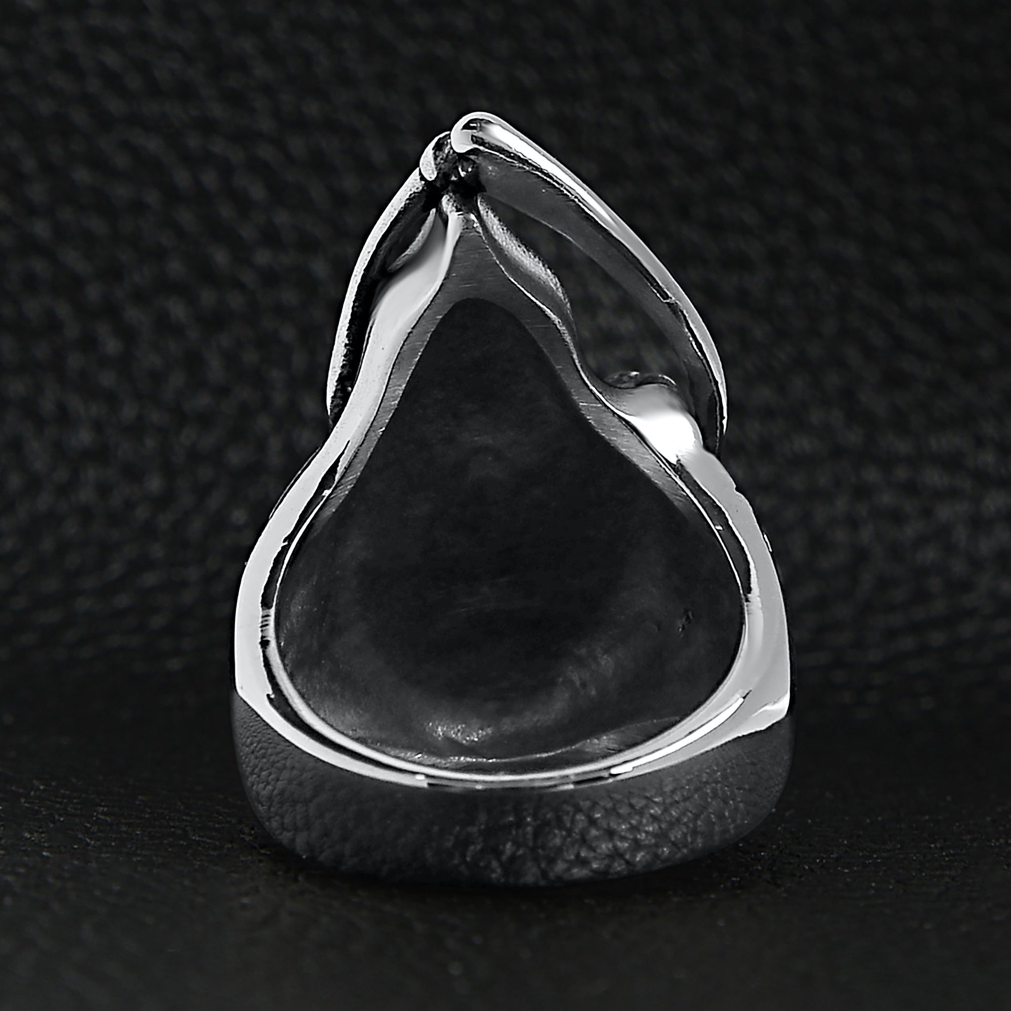 Silver hooded ring with teardrop shape shown flat on black | Chaps London